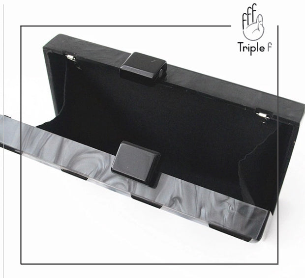 Zigzag black clutch
