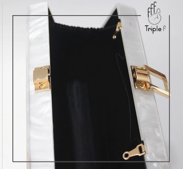 Pearl and gold clutch