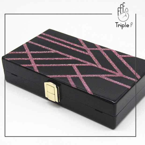 Black and pink clutch